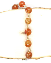 Load image into Gallery viewer, Orange Crackled 10 mm Agate Braided Bracelet
