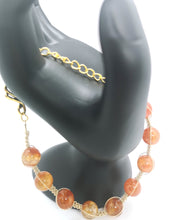 Load image into Gallery viewer, Orange Crackled 10 mm Agate Braided Bracelet
